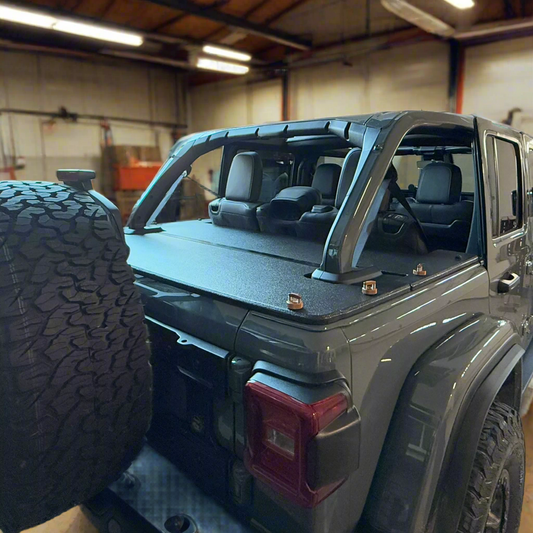 2024 JLU hardtop rhino lined cargo cover with Rockworkx gold thumbscrews