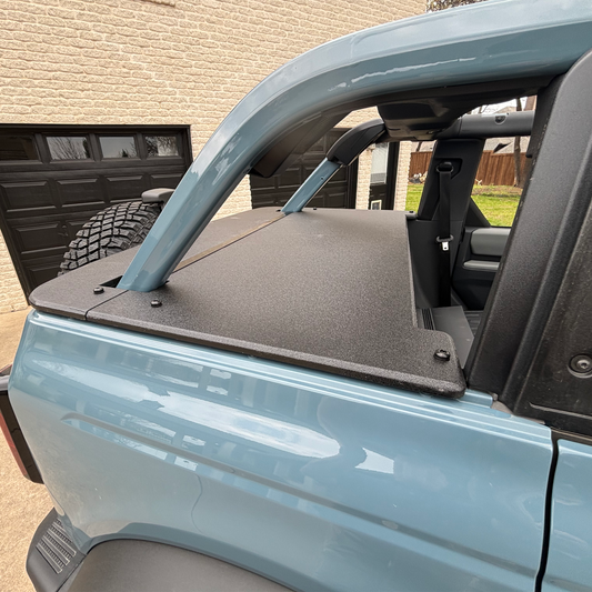 Cactus Gray Bronco with JFTops Rhino-lined Tonneau Cargo Cover installed in rear