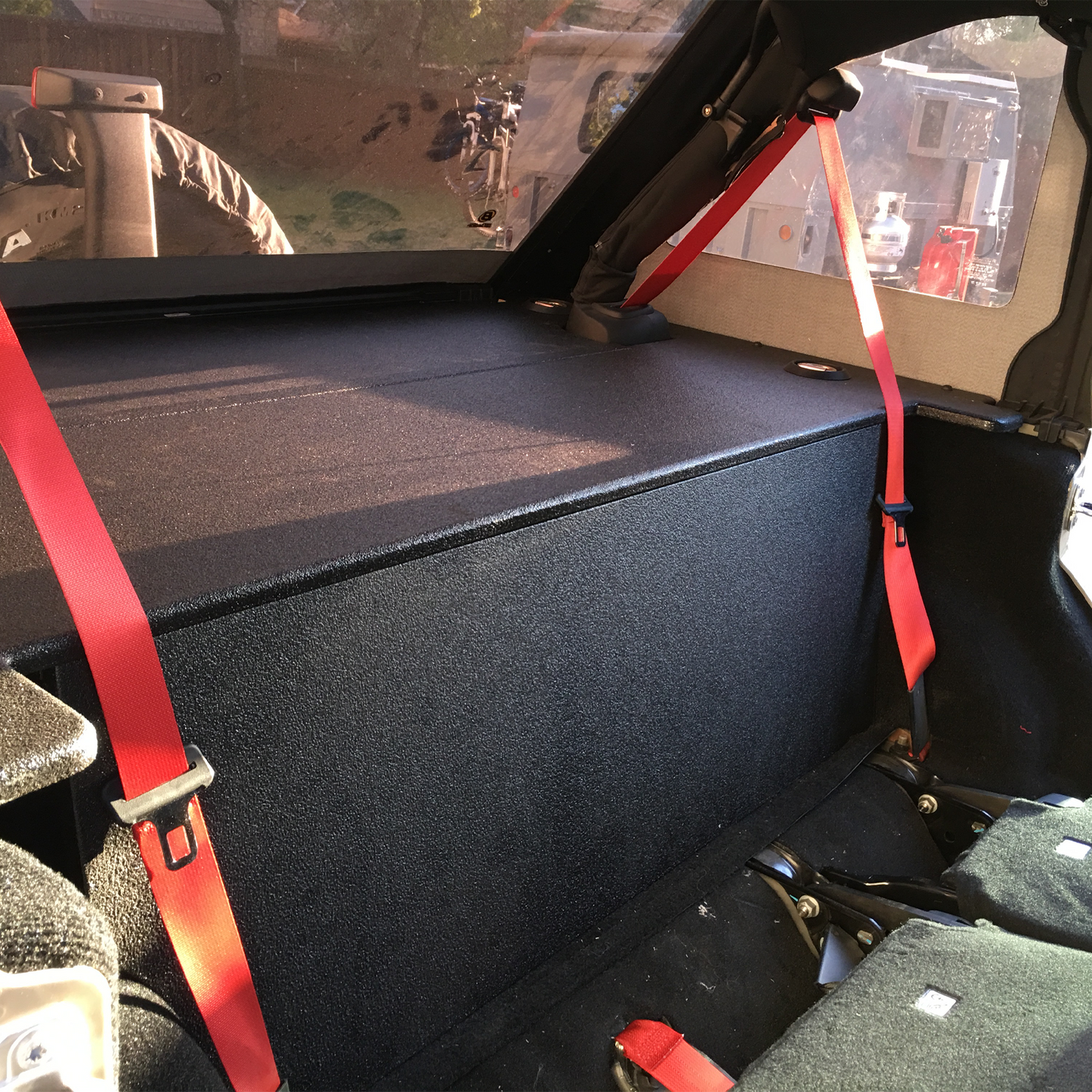 Interior view of slantback Wrangler JKU cargo cover security board by JFTops