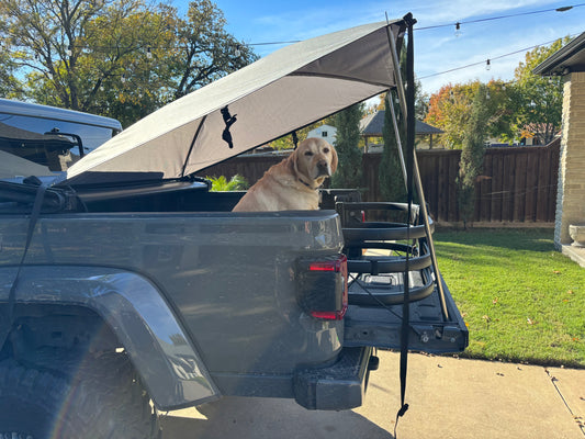 Sport Trail Topper covers JT Jeep gate with dog in back