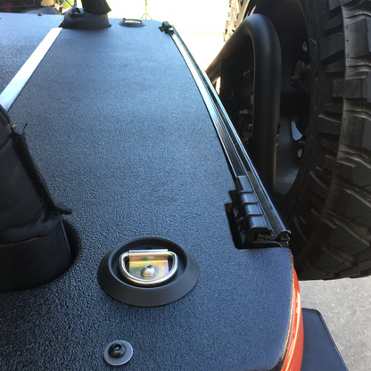 Close-up of a JKU Wrangler soft top cargo cover rhino-lined by JFTops