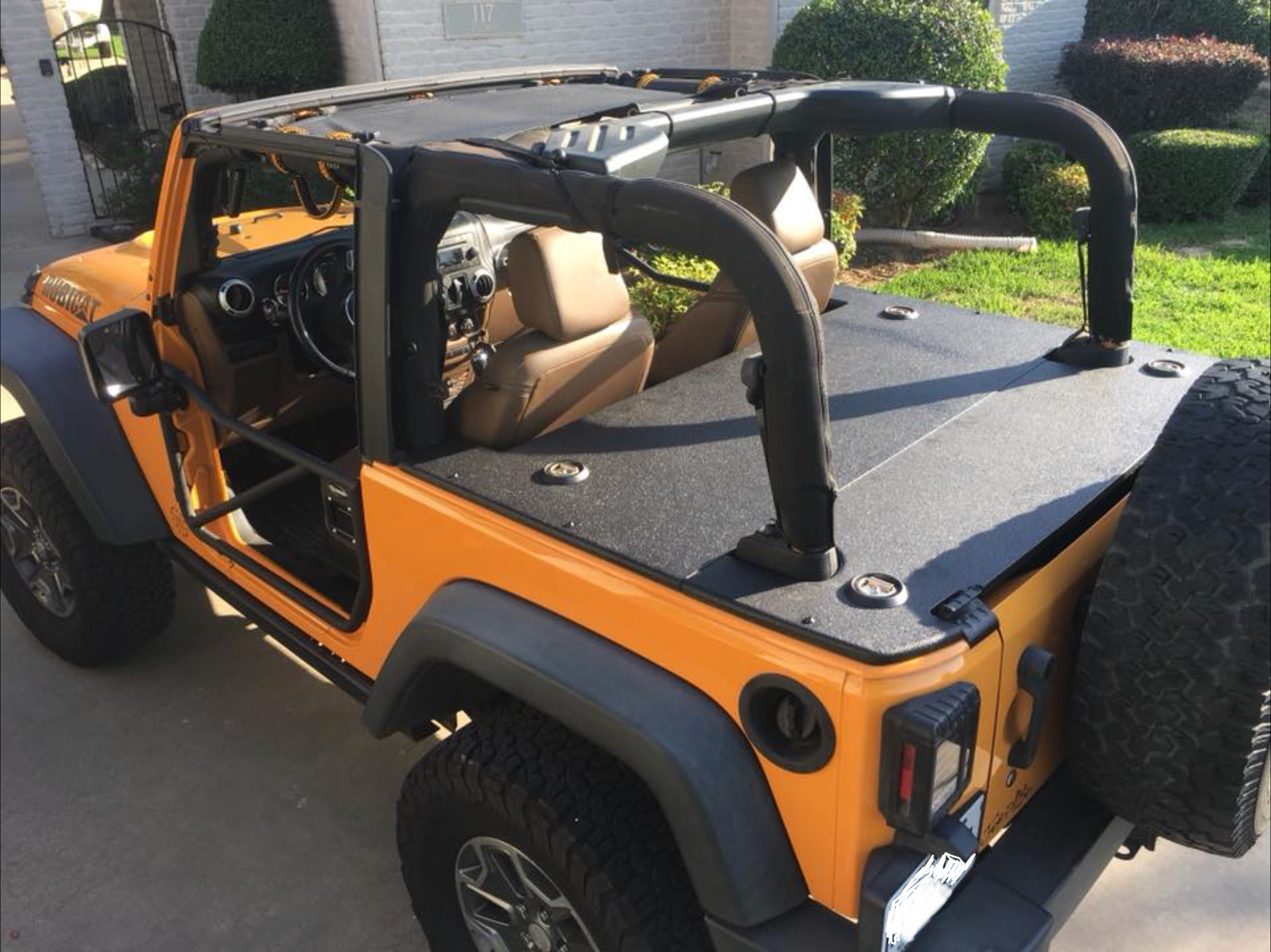 JFTops Wrangler JK 2-door soft top tonneau cargo cover wood and rhino lined on Sunburst orange pearl Jeep