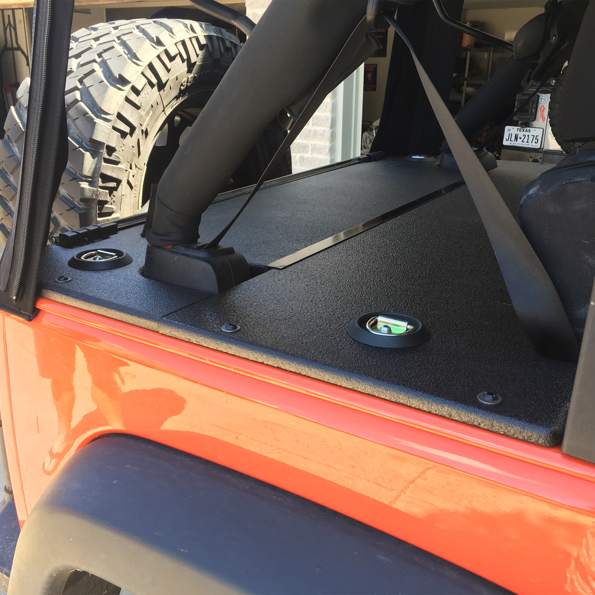 JKU soft top orange Wrangler with JFTops rhino lined cargo cover