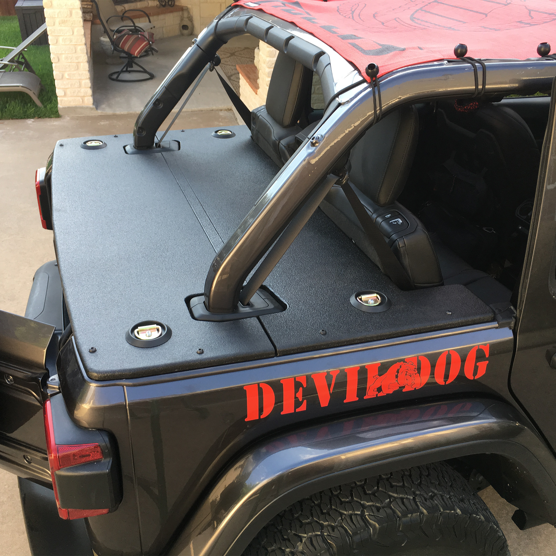 JLU Wrangler Hard Top Tonneau Cargo Cover on Black Jeep with Devil Dogs name