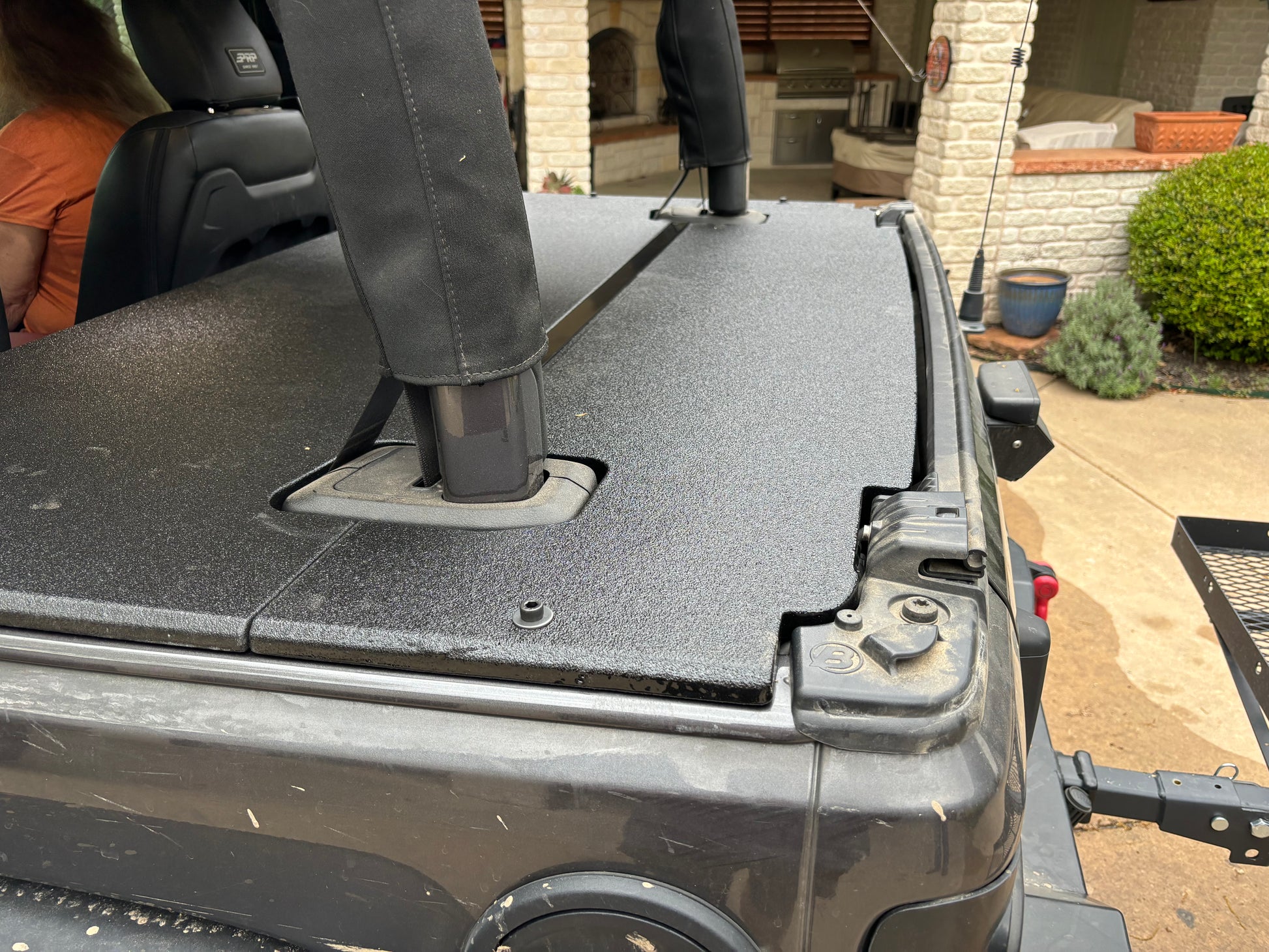Close up of a Wrangler JL 2-door Rhino Lined Soft Top Cargo Cover by JFTops