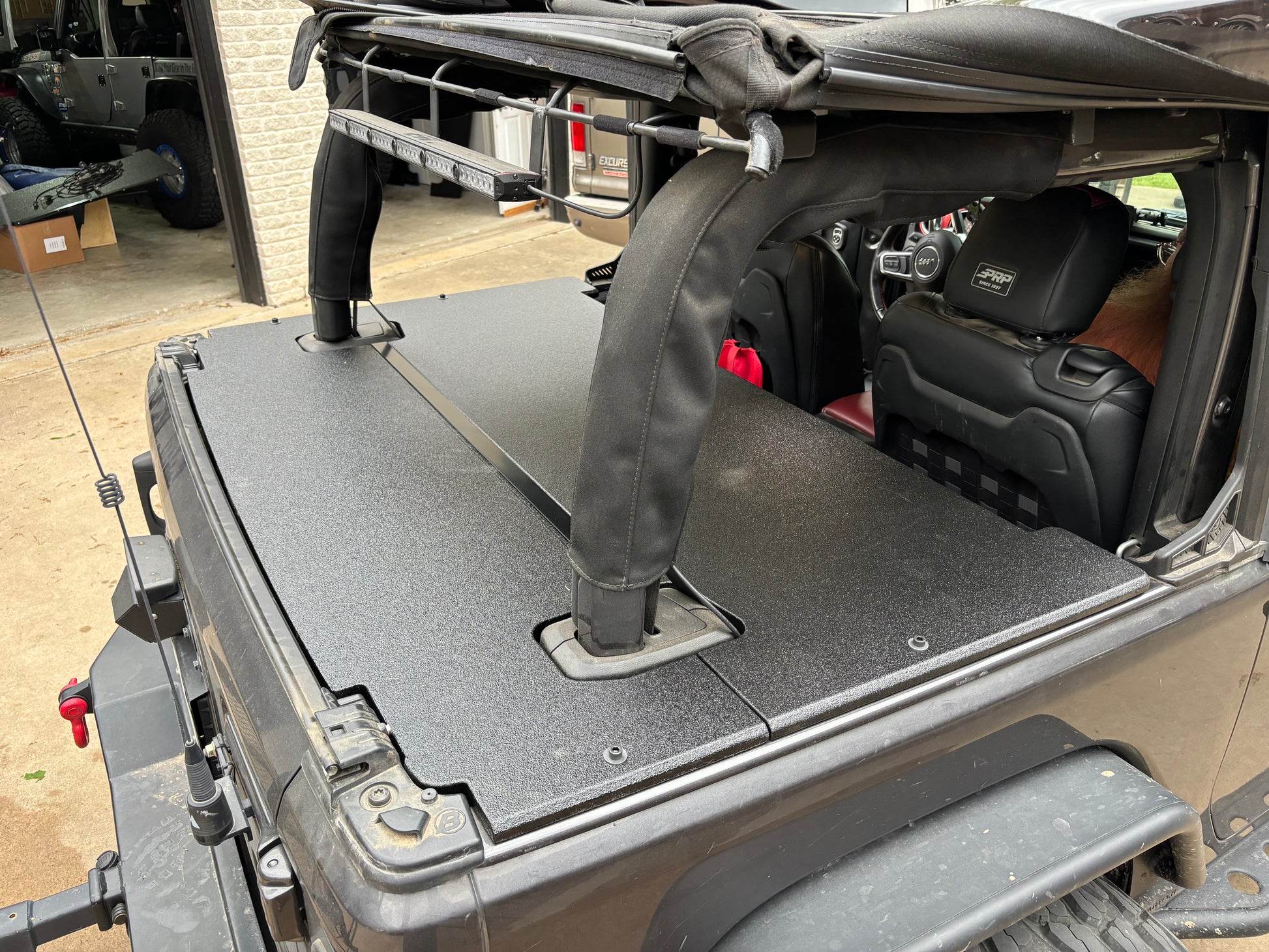Top view of a Wrangler JL 2-door Rhino Lined Soft Top Cargo Cover