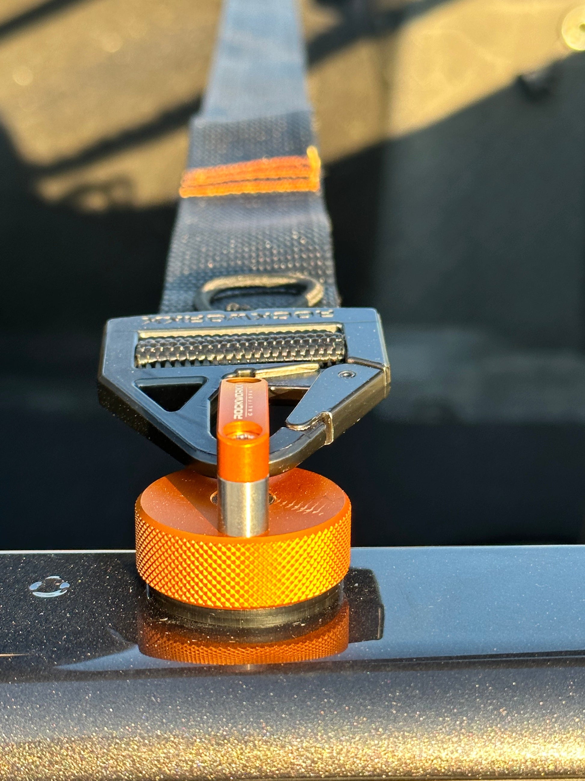 Rockworkx 2 in tie-down strap with 1.5 in molle connector Orange 