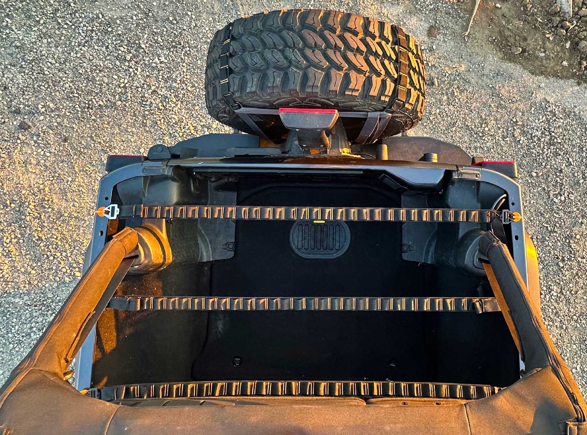 Rockworkx 2 in tie-down strap with 1.5 in molle connector Orange thread