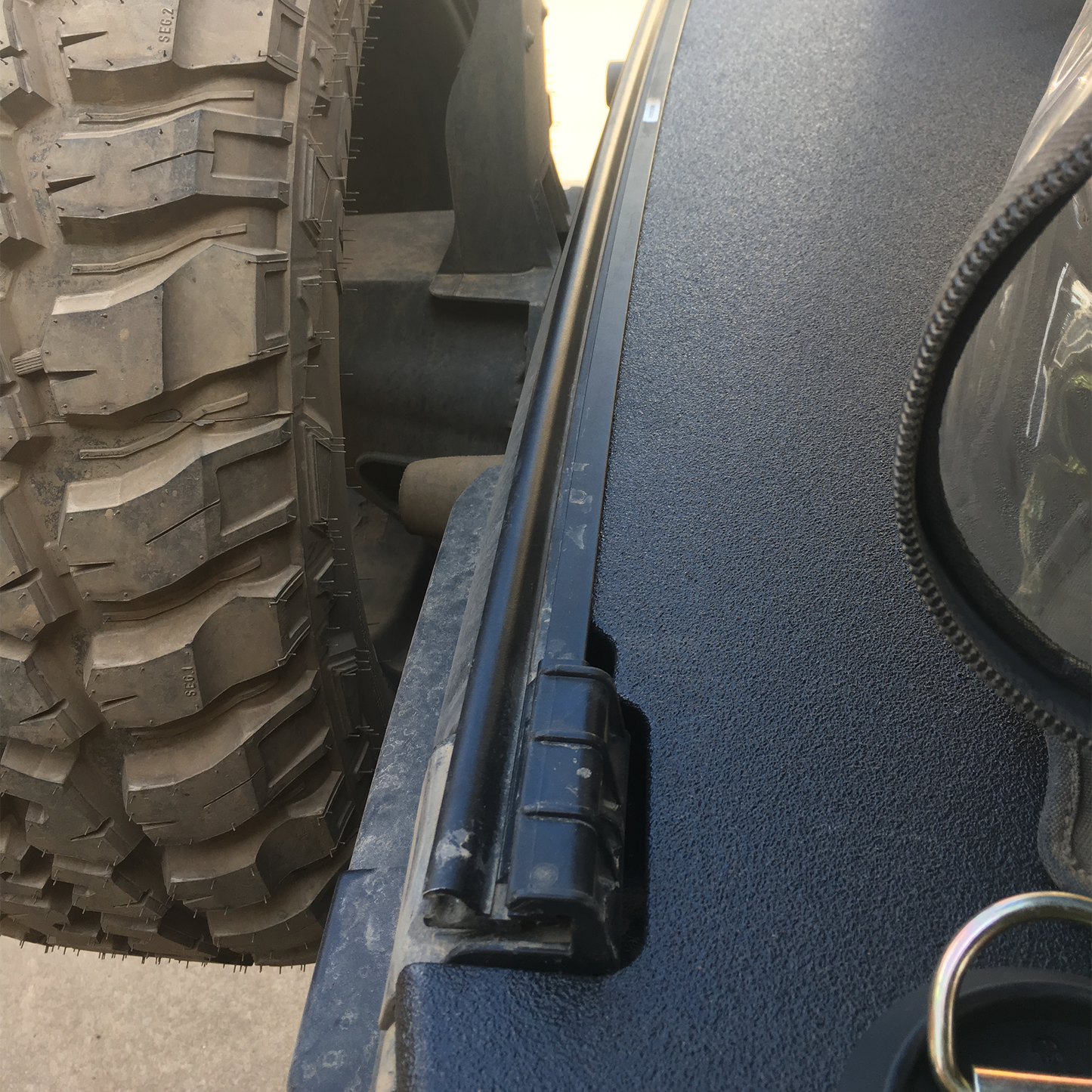 Close-up of Wrangler JK soft top JFTops cargo cover rhino lined